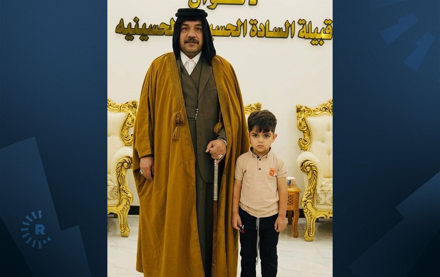 وێنەی منداڵەکە لەگەڵ باوکی 